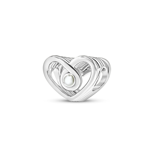 Bente silver breast milk charm, open heart in one looping line with a small round milk stone