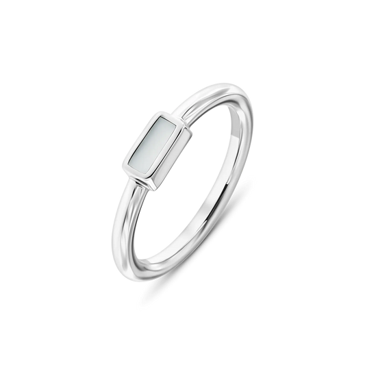Britt breast milk ring in silver with a rectangular milk stone on a thin band