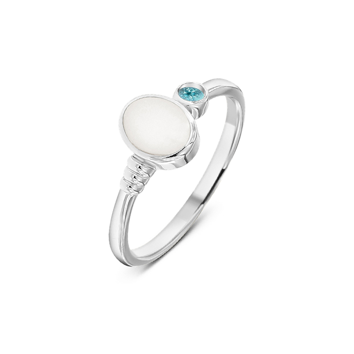 White gold Elisa breast milk ring with an oval milk stone, ribbed band detail and a December blue topaz birthstone