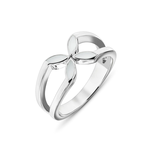 Silver Fleur breast milk ring with a flower of four pointed milk-filled petals on a split band