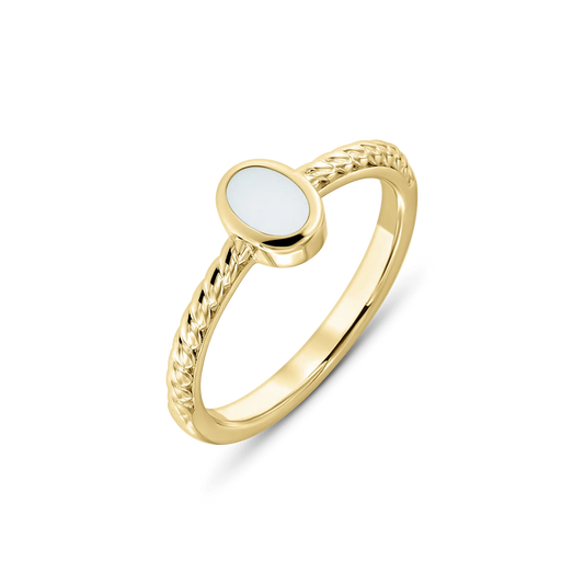 Yellow gold Ilse breast milk ring with an upright oval milk stone in a smooth bezel on a twisted band
