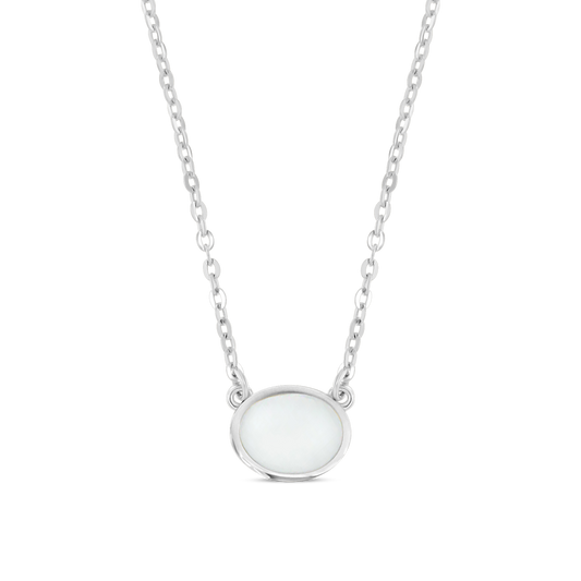 Juna silver necklace with a sideways oval breast milk stone in a slim bezel between the chain