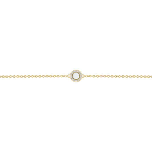 Juul yellow gold breast milk bracelet with round milk stone in a halo of small clear stones
