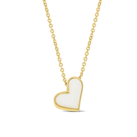 Louisa yellow gold necklace with a tilted heart pendant filled with breast milk