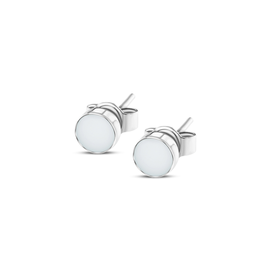 Pair of Mini Lis silver small round studs with flat breast milk stones in straight-sided settings